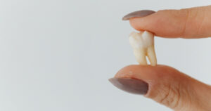 the key factors to consider before removing a tooth